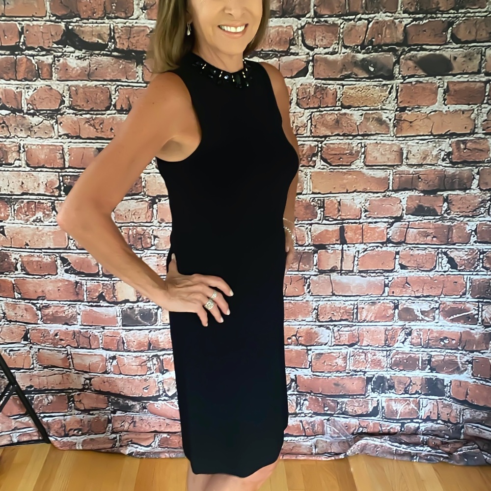 Women's elegant black dress. Size s